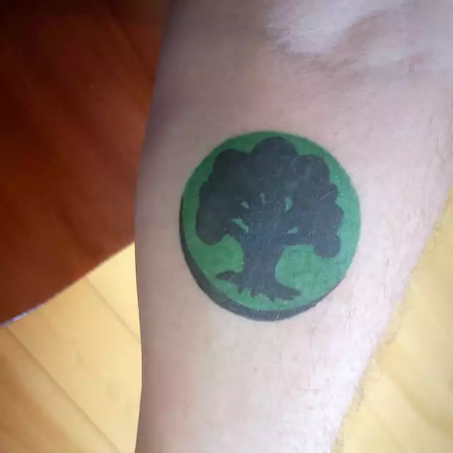 Forest symbol tattoo